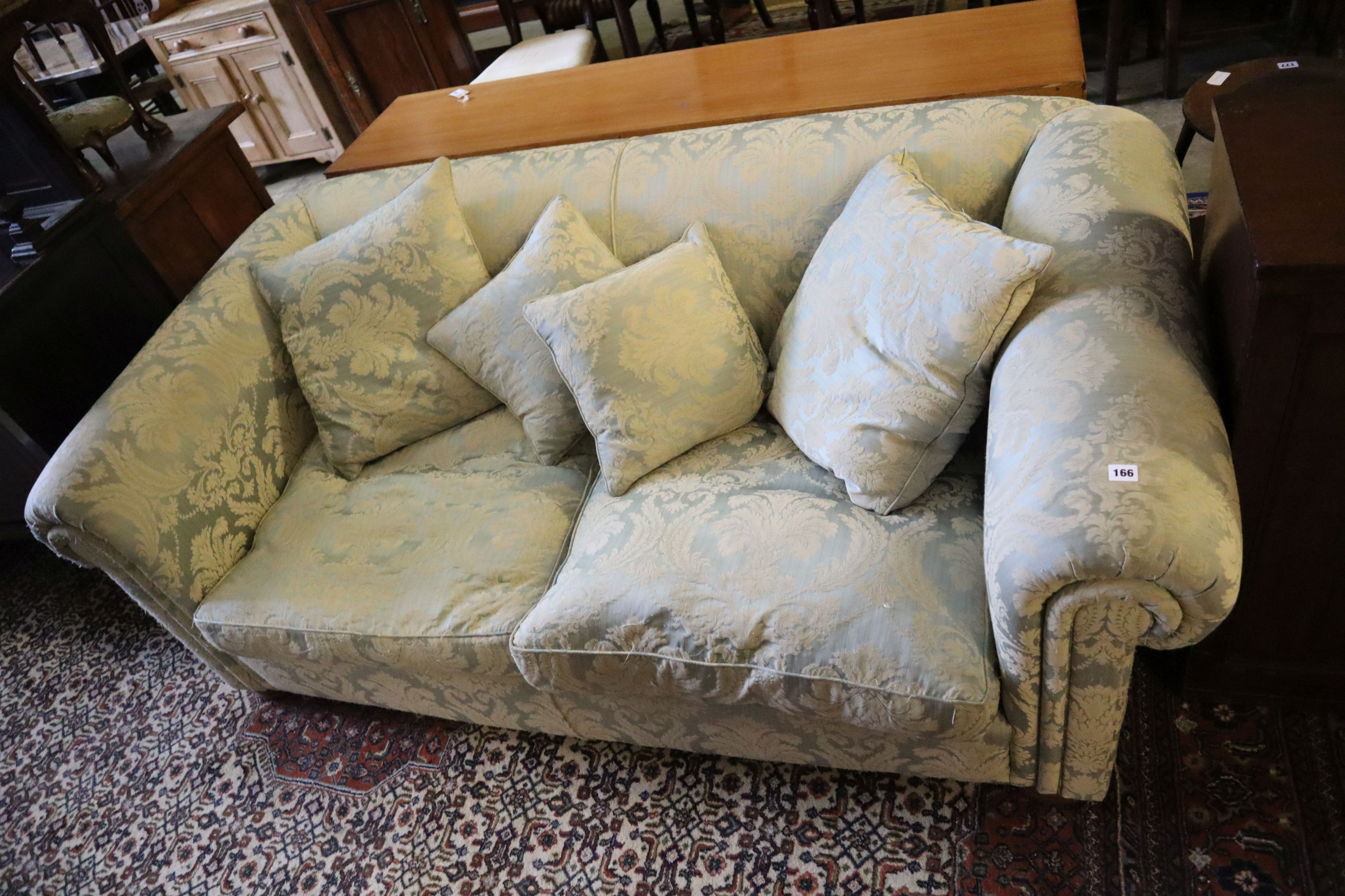 An early 20th century upholstered Chesterfield settee, length 200cm, depth 110cm, height 70cm